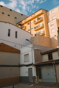 Low angle view of urban residential buildings in Valencia, Spain.